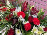 Red and White Casket arrangement